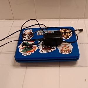 Portable DVD player (not a blue ray player) comes with free movies